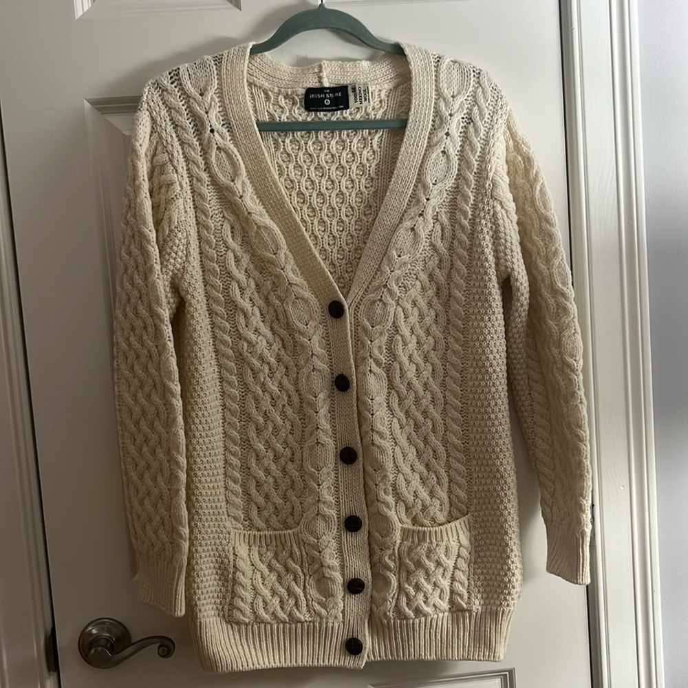 Brand new. Never worn Irish Store cardigan.